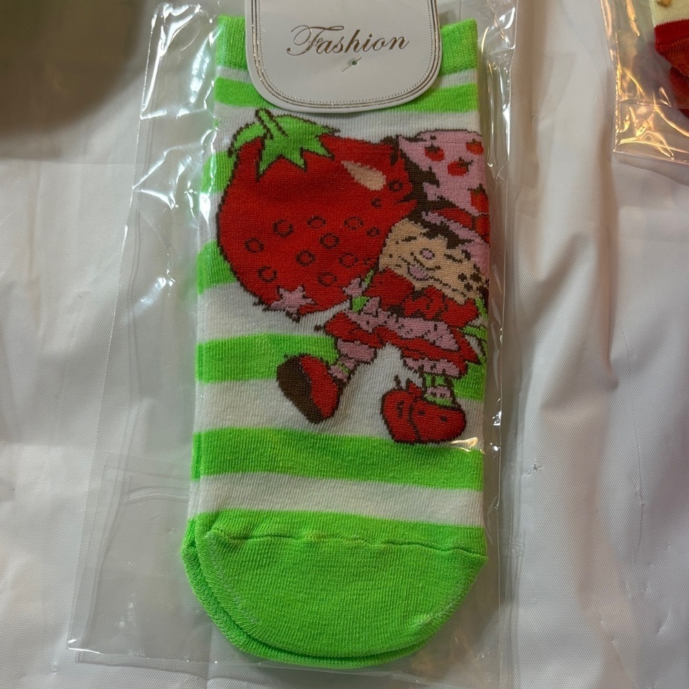 Green and White Striped Socks with Strawberry Design